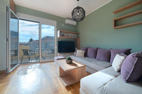 Two bedroom apartment with garage in Budva